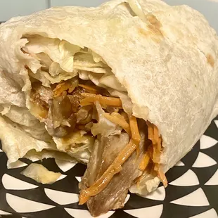 a wrap with meat and vegetables
