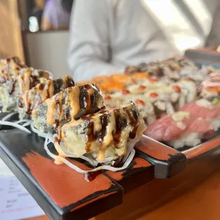 a sushi platter with various types of sushi