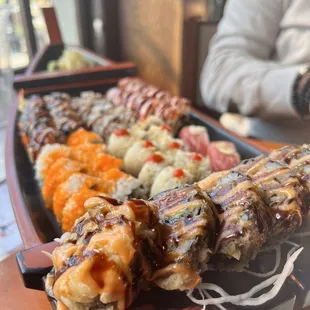 a large platter of sushi