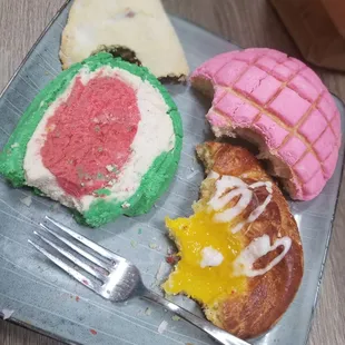 a plate of pastries and a fork