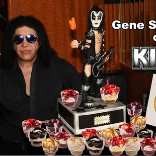 Gene with is cheesecake statue