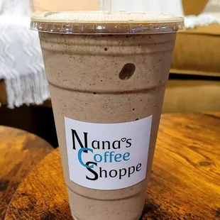 a cup of coffee on a table