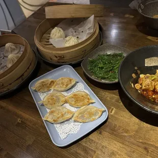 Hot &amp; Sour Soup Dumplings, Signature Bao, Shrimp &amp; Pork Dumplings, Seaweed Salad, Red Sea Chili Wonton