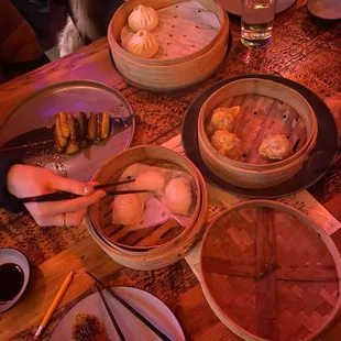 Shu Mai, Shrimp Dumplings, Pan Fried Pork Buns,Spicy Cucumber Salad