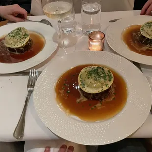 Ravioli on top of lamb! Why? Why not? I think the green is spinach.