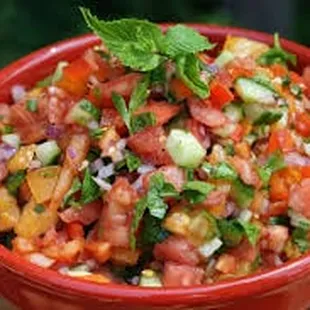 Classic Israeli Salad and a variety of other specialty salads