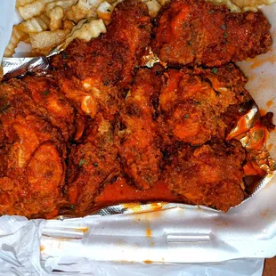 Cajun Fried Wings and French Fries.