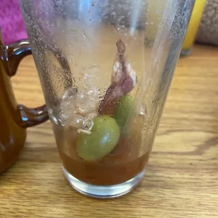 Spivey Bloody Marry. I thought there was nothing inside and SURPRISE!! The bacon, Pickles, and Olives. This is one of my favorite Bloody&apos;s!