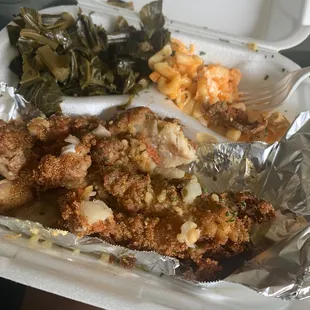 Garlic parm fish, Mac n cheese and greens. Fish was very hard, Mac n cheese looked like it's been sitting out for days