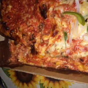 Pictures of my mishandled pizza after receiving be wrong order the first time I called