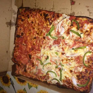 Pictures of my mishandled pizza after receiving be wrong order the first time I called