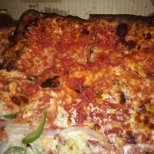 Pictures of my mishandled pizza after receiving the wrong order the first time I called