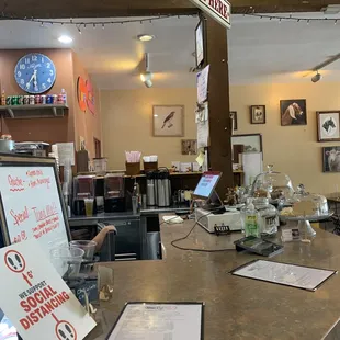 a counter with a sign on it