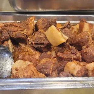 Pork binagoongan (pork braised in shrimp paste)