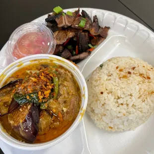 a plate of food with rice and vegetables