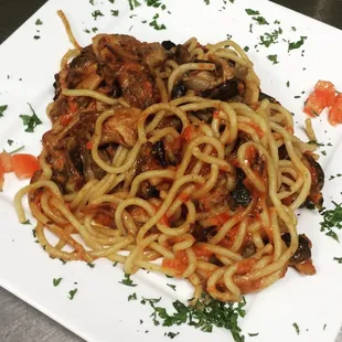 Eggplant pasta.  One of the dishes they can make as spicey as you like.  Outstanding!