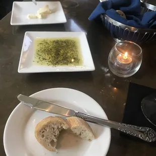 Bread, pesto oil and butter