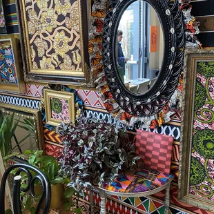 a room with a mirror and a bench