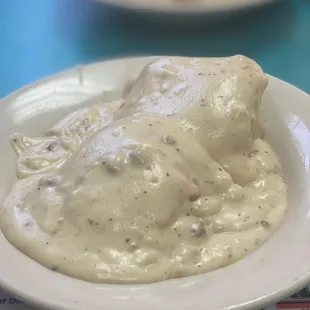 Biscuits and gravy with tons of gravy.