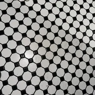 a black and white tiled floor