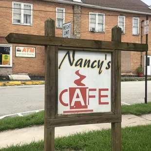 a sign for nancy's cafe