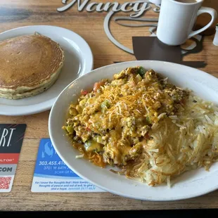 Ultimate skillet with chorizo and side of pancakes, yum!