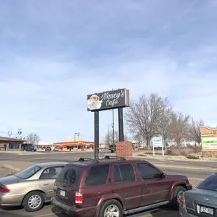 Sign. Loads of parking around the building too.