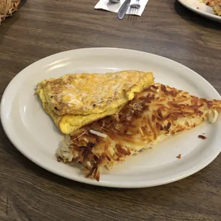 Cheese omelette. Comes with hash browns. You also get toast, pancakes, or biscuits and gravy.