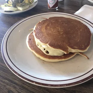 Sides include toast, biscuits and gravy, or pancakes. These are the pancakes. Mmmm