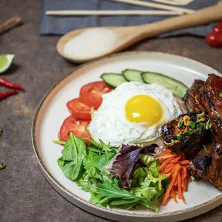 Grilled Pork Ribs and Fried Egg Rice Plate
