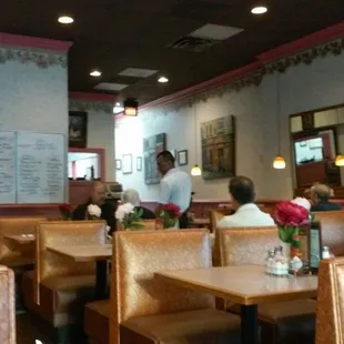 Seating area and there are always specials written on the white board.