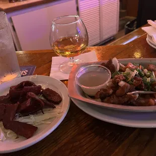 Pipikaula (fried beef) $5.75 and some Lechon (crispy pork) $13.50 12/08/2022