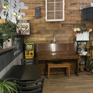 a piano in the corner of the room