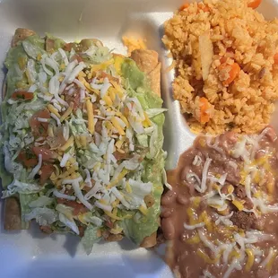 5 rolled tacos with rice and beans