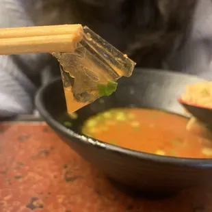 The tomato ramen with an extra topping of plastic.
