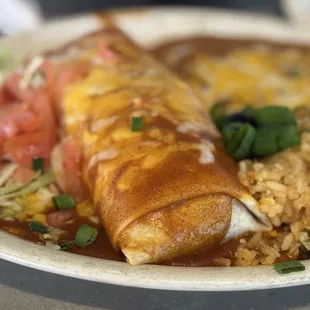 Lunch special - burrito (w/ birria beef) with enchiladas sauce, rice, &amp; beans.