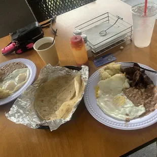 Chicken and beef fajita plate. Comes with beans, potatoes, eggs and tortillas.