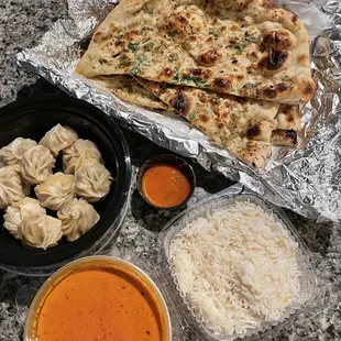 Garlic Basil Naan, Chicken Momo, Butter Chicken