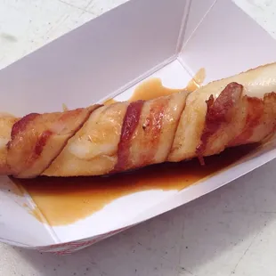 a hot dog wrapped in bacon