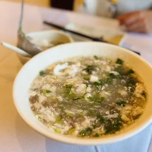 a bowl of soup on a table