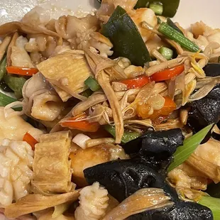 a plate of stir fried noodles