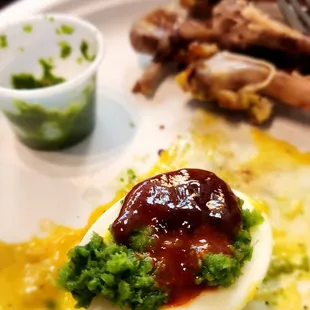 Egg with the green spicy salsa and BBQ sauce