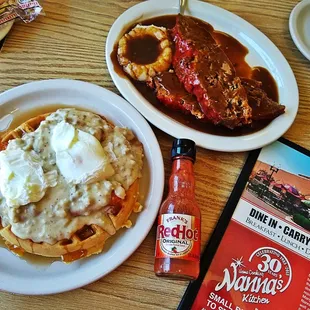 Chicken n Waffles smoothered with Sausage Gravy topped with Poached Eggs and Meatloaf