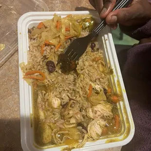 We were hungry and started eating...chicken curry, rice, veggies and plantains that she ate already