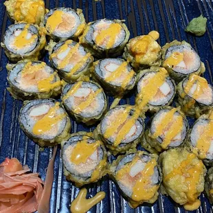 a plate of sushi rolls