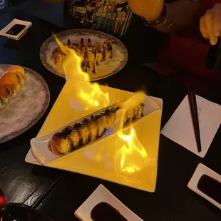 a plate of sushi on a table