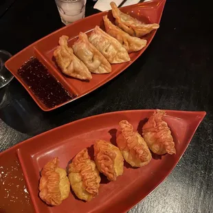 a plate of dumplings and a plate of dumplings