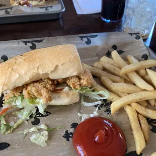 Shrimp Poboy and fries. Sorry, but I&apos;d already taken 2 bites before I took the picture.