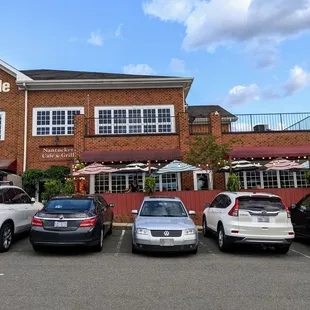 Outside. Storefront view from parking lot. Located in the Pinnacle building at Carolina Pointe I on Farrington Rd at 54.