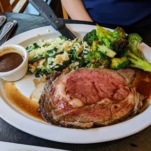 Herb-Roasted Prime Rib, medium rare. 12 oz for $32. Au jus, risotto, and broccoli. Only available Saturday after 4pm and all day Sunday.